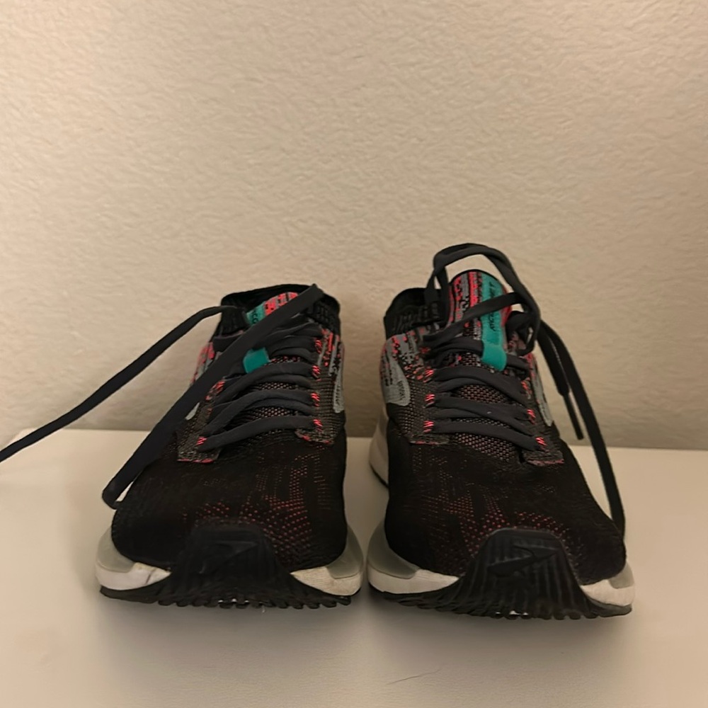 Black and Hot Pink Brooks Ricochet Running Shoe.